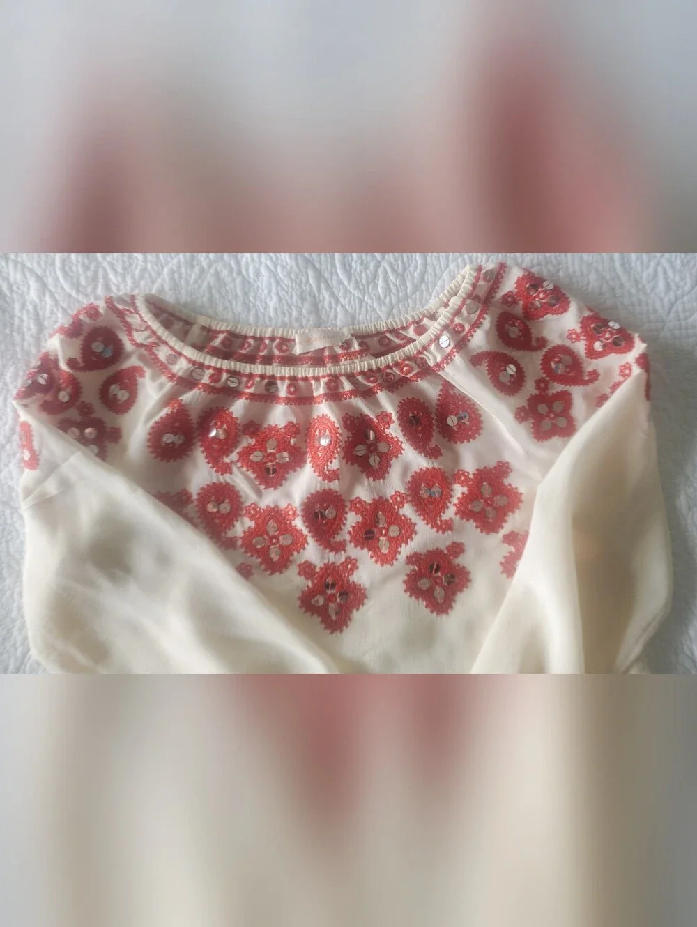 Tory Burch features intricate